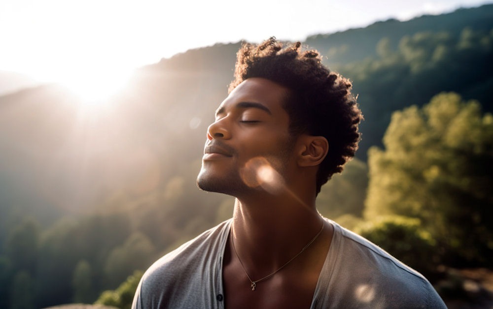 young man outdoors enjoying the sun