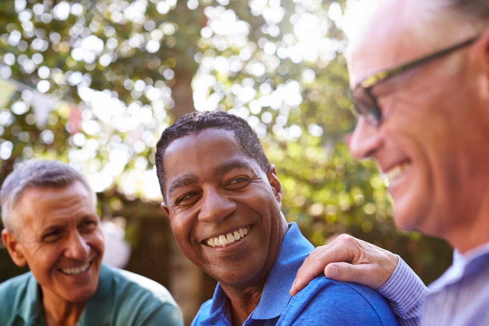 group of men smiling