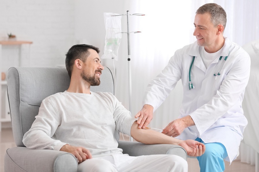 doctor assisting a patient