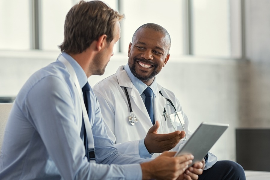 doctor speaking with colleague